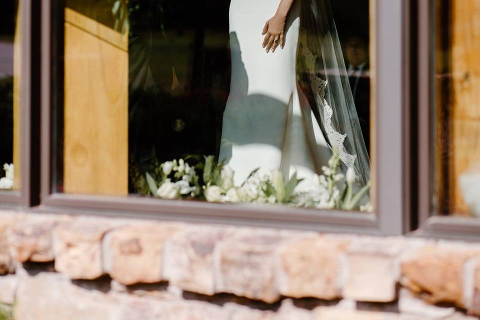 Bride through west window