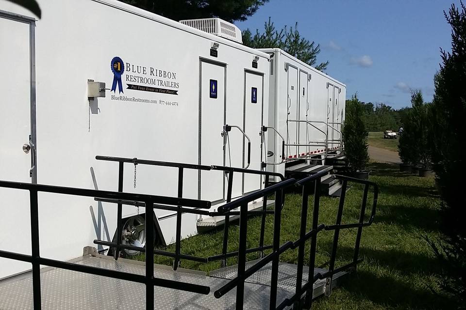 Blue ribbon restroom trailers