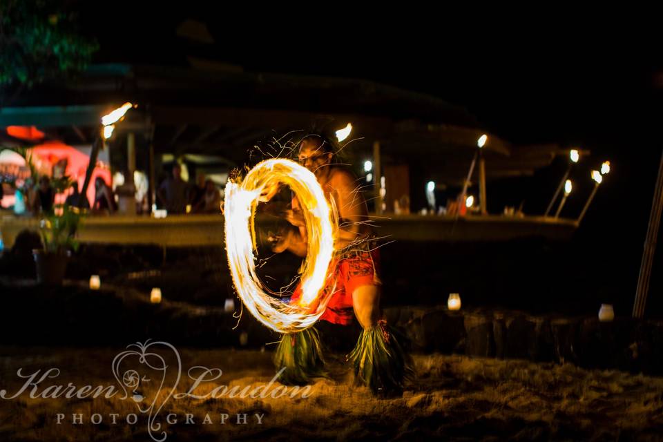 teeaoteturama fire dancer performs at a private wedding luau at Royal Kona © Karen Loudon