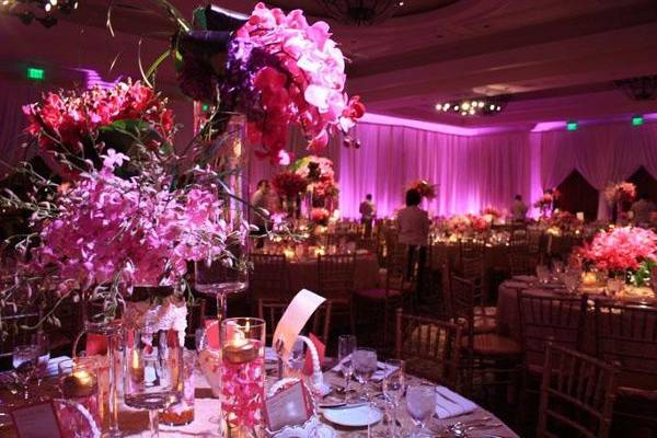 Wall Draping with LED uplights and Pinspots on Lush Centerpieces