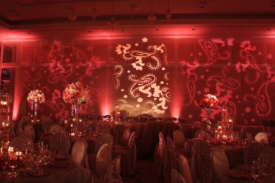 Damask Patterns projected on the aisle runner is a refreshing twist in giving your ceremony a contemporary look.