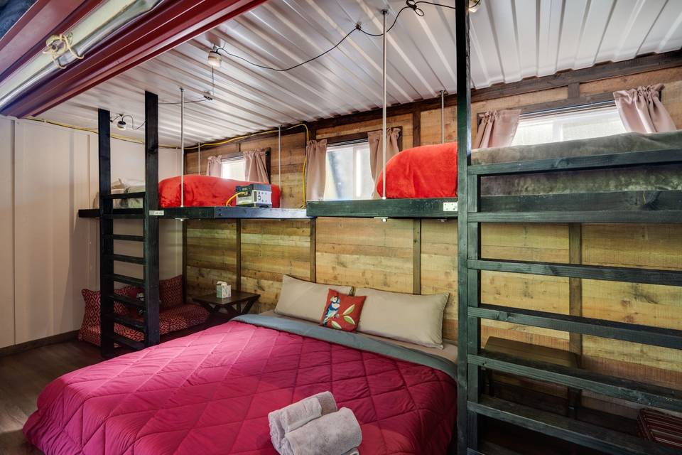 King sized bed and bunkbeds