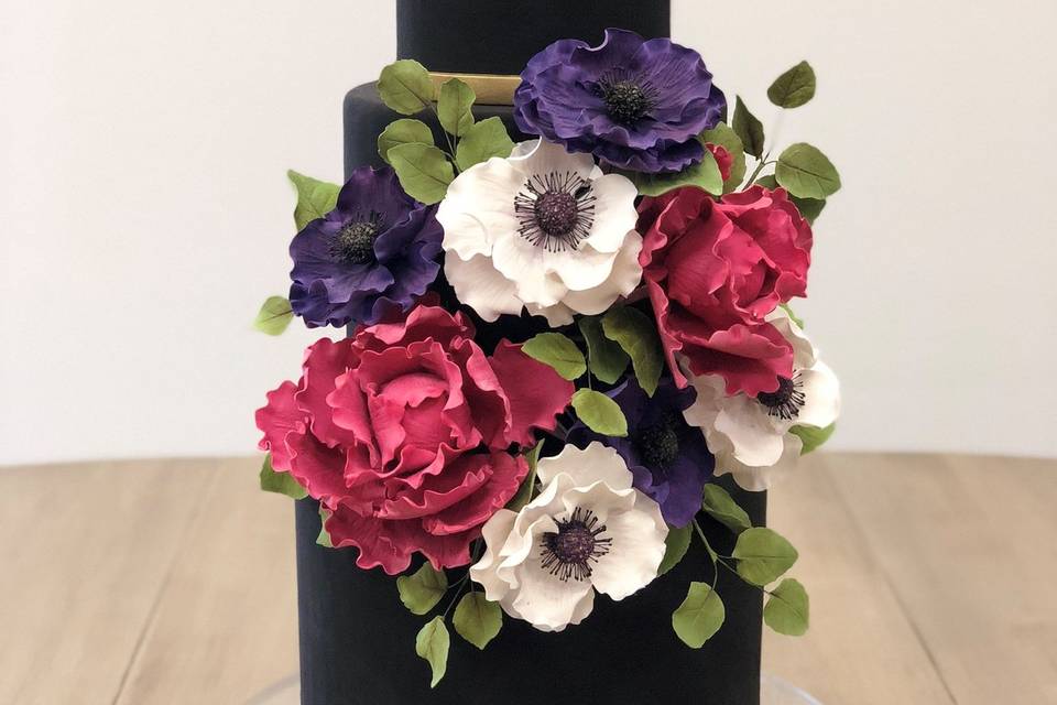 Black cake with flowers