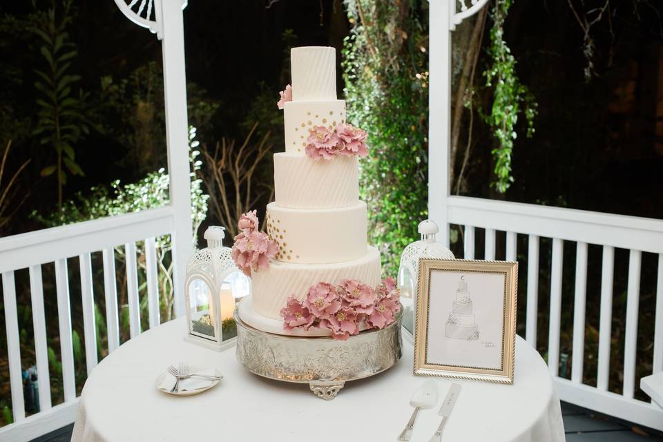 Five tier cake with pink flowers