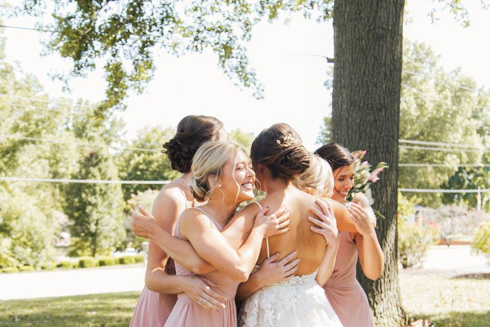 Bridesmaids admiring the bride