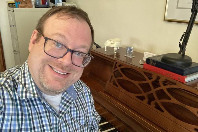 Mr. Bridge at his piano