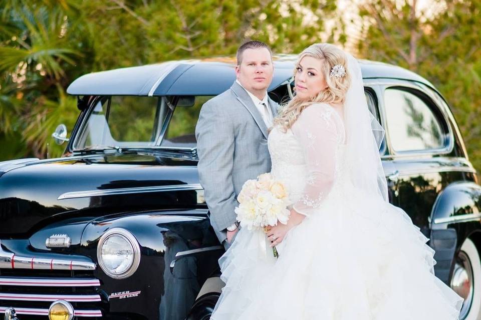 A stunning couple & their ride