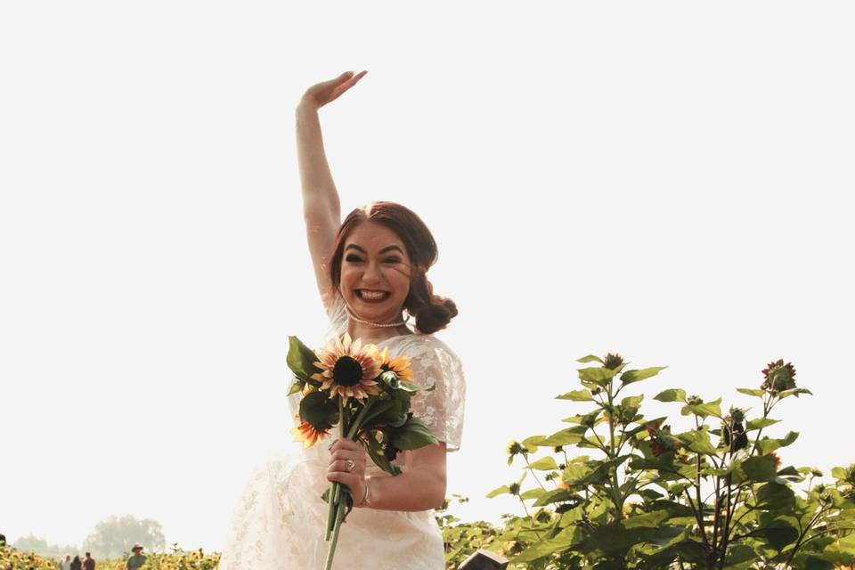 Bride jumping for joy