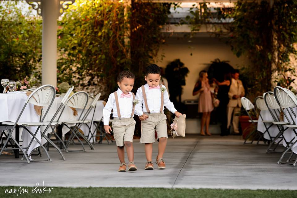 Bridesmaids helping out the bride