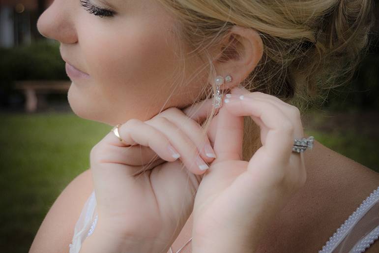 Bride Adjusting Her Earring