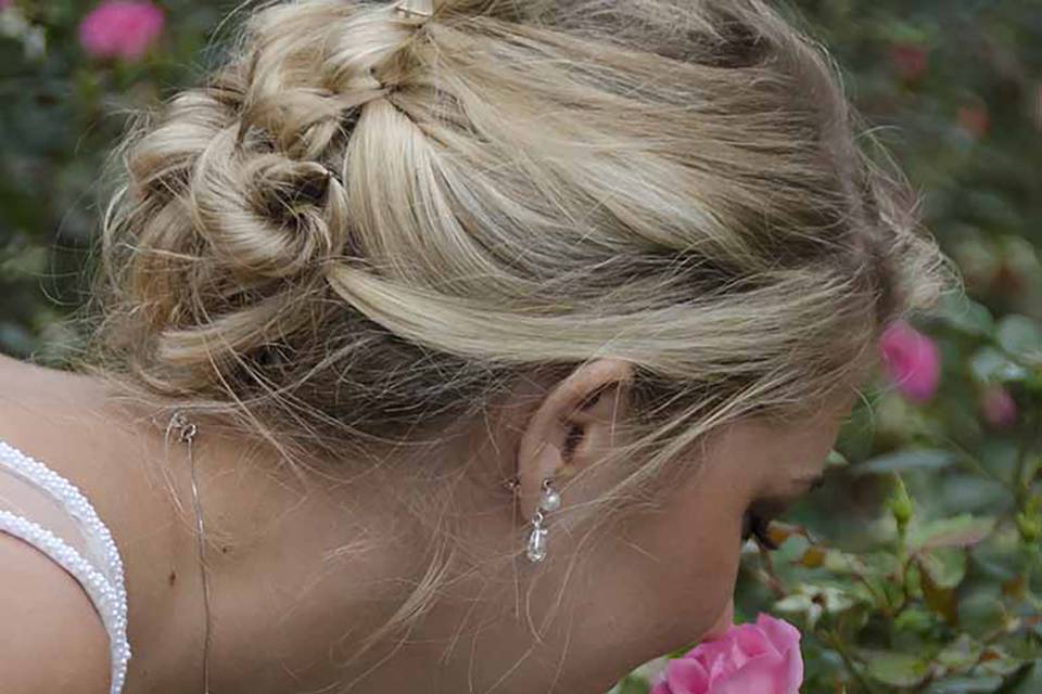 Bride Stops to Smell the Roses
