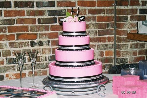 Pink and Black wedding cake at the Parrot Bey Ballroom in Pittsburg, KS.
