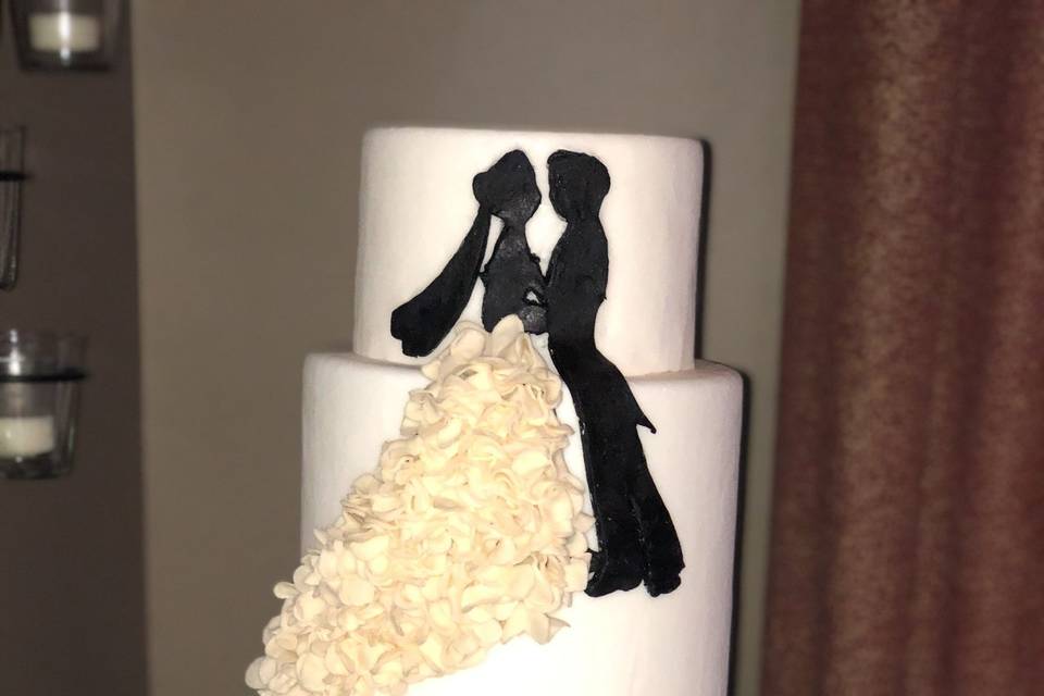 The bride and groom themed cake