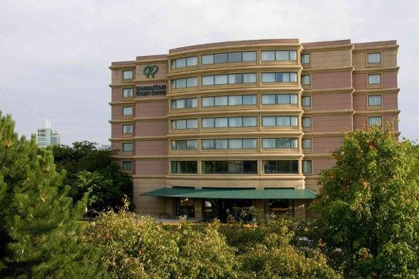 Exterior view of the Doubletree Guest Suites Hotel. 247 All Suite accommodations. Ride the Elevator home after your reception!