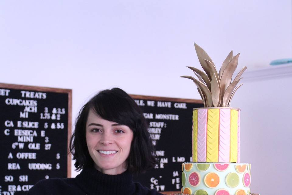 Owner + Chief Monster Ashley Holt pictured with her cake made for Martha Stewart Living