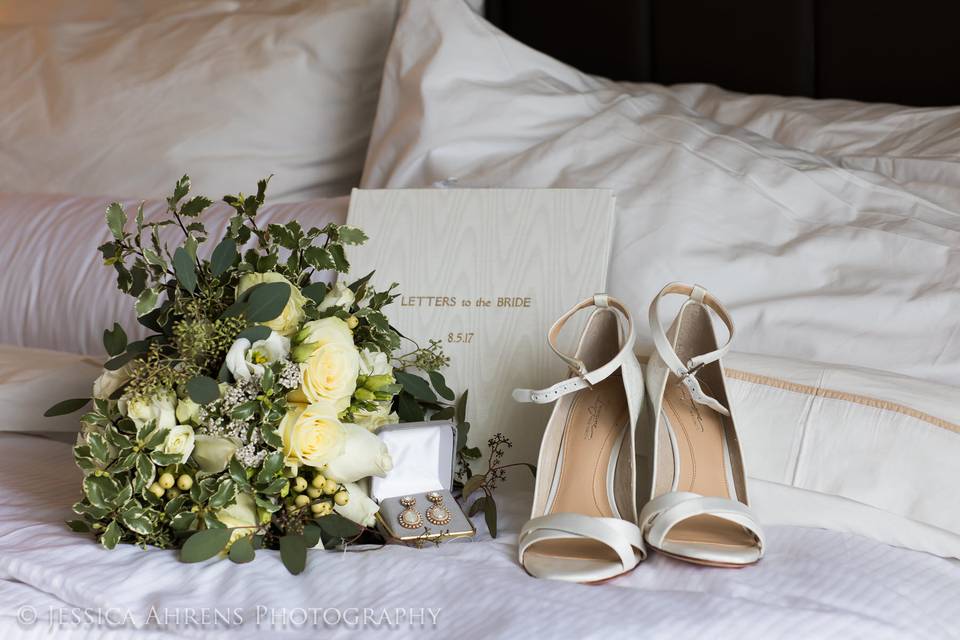 Bride's shoes and bouquet