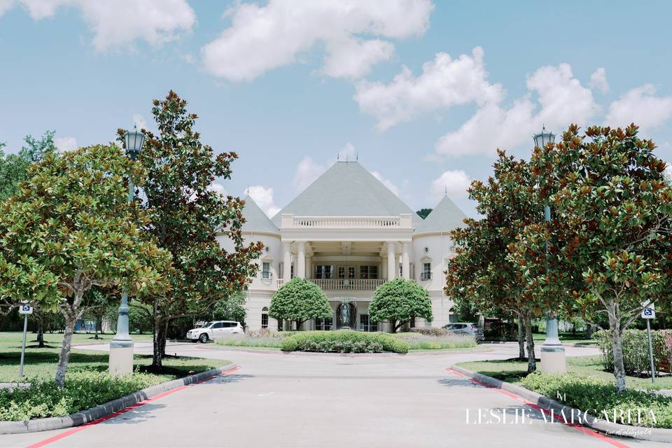 Grand entrance + parking lot