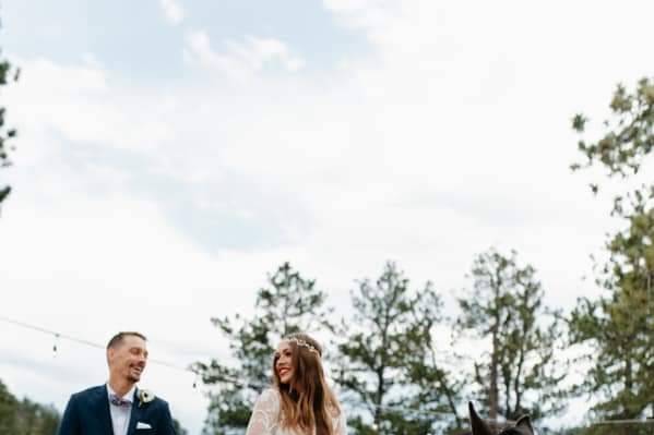 Newlyweds on horseback