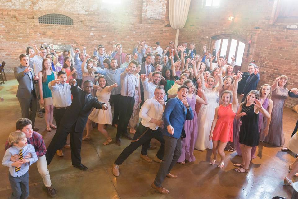 DJ Robert dancing with the guests