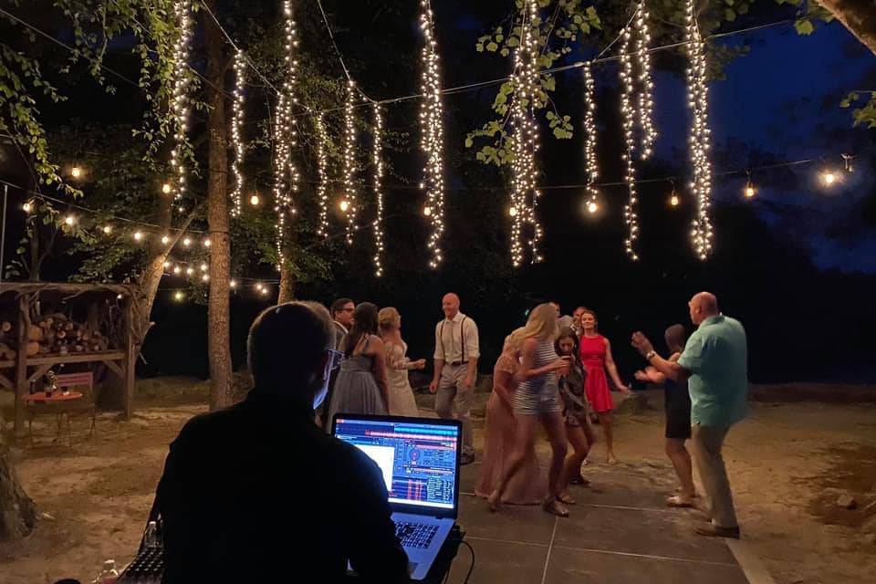 Groom dancing at the reception