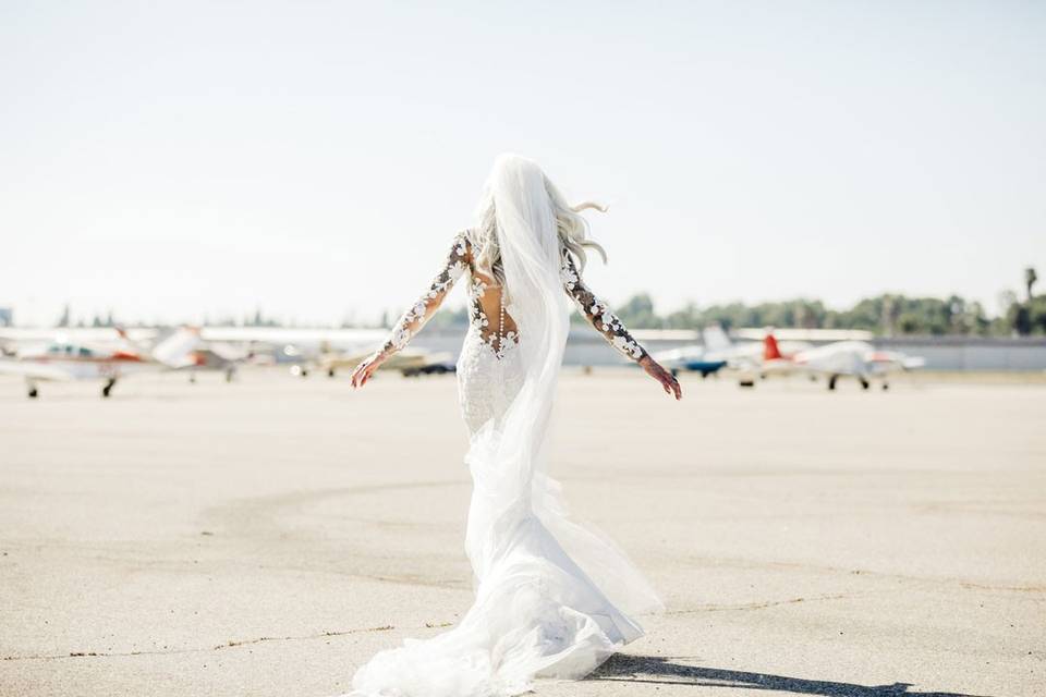 Bride on tarmac