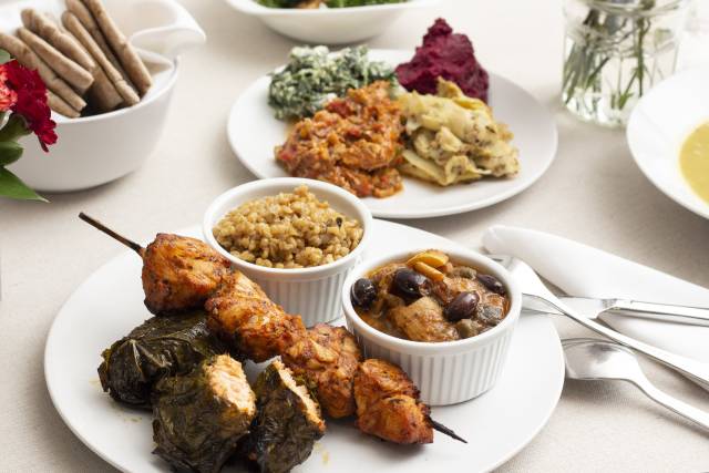 In-house dishes on white linen