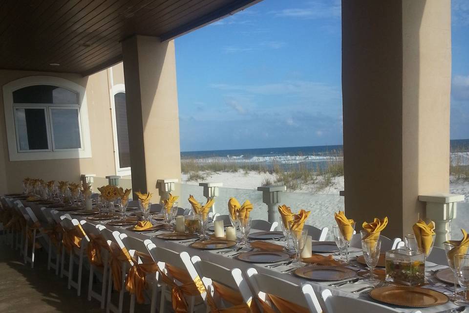 This beach rental hosted the reception on the balcony!  What a view.