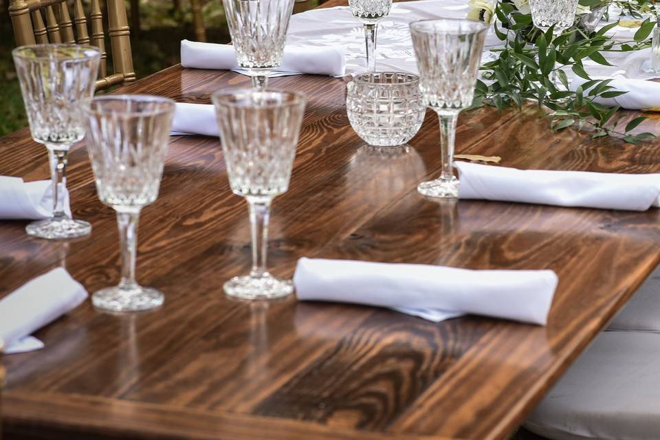 Notice the beautiful sheen on the farm table--and of course the cut crystal glasses.