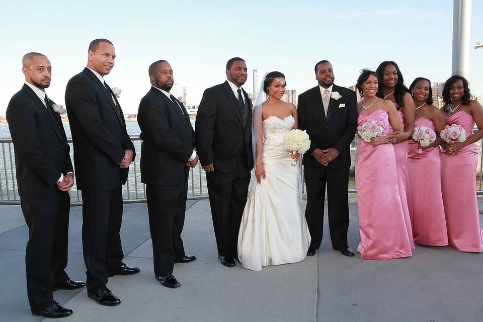 The couple with the bridesmaids and groomsmen