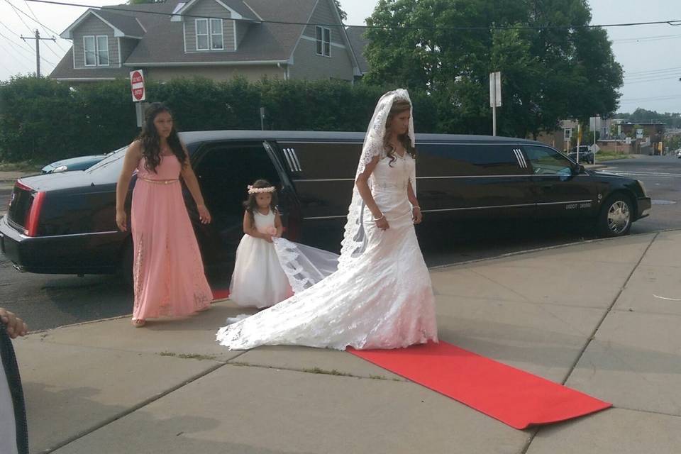 Red carpet roll out for a bride arriving to her wedding!