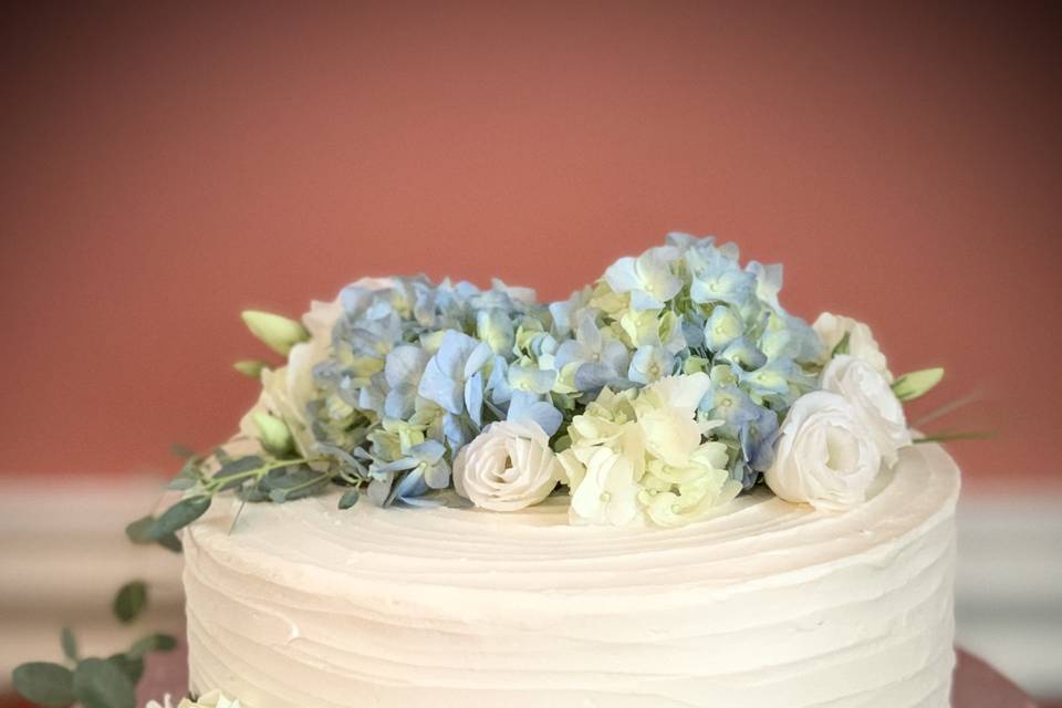 Soft blue hydrangea and roses.