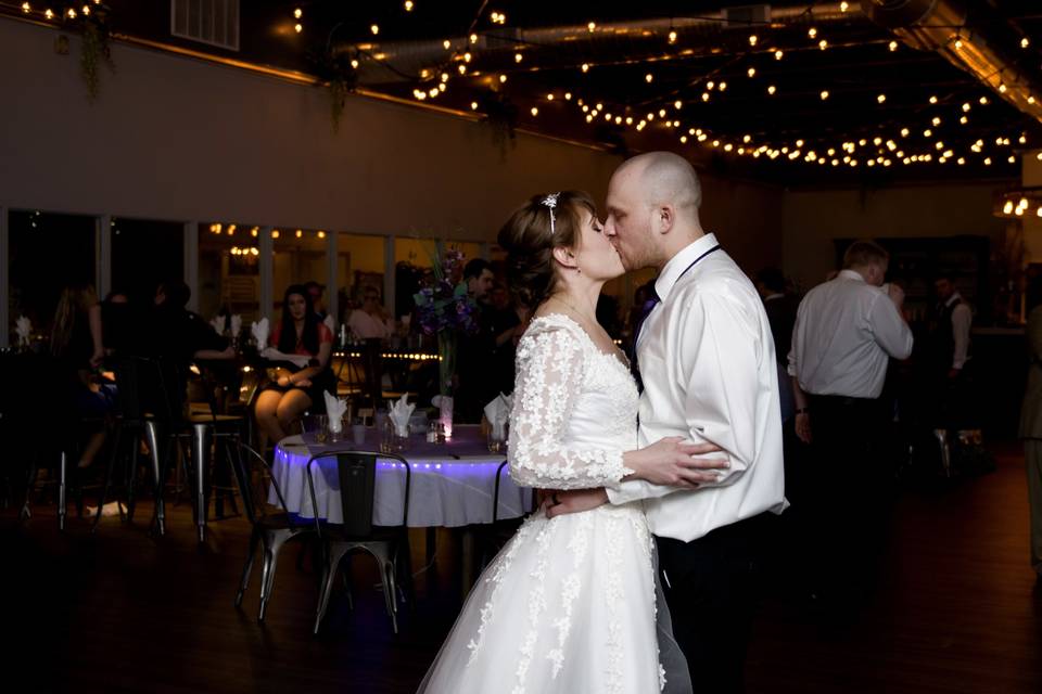 Newlyweds kissing