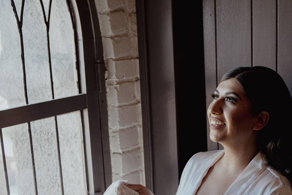 Bride admiring her dress