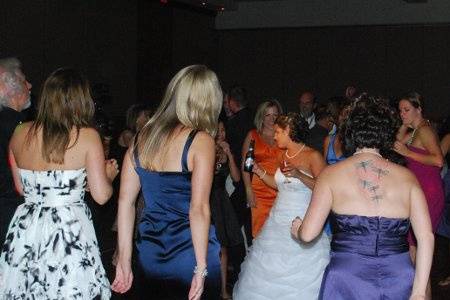 The bride with her guests dancing