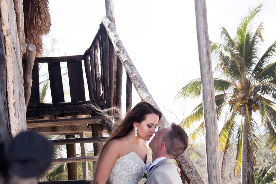 Wedding portrait before a tropical backdrop
