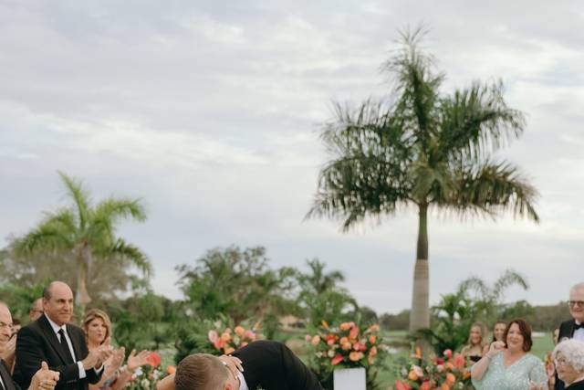 Bride and groom kiss