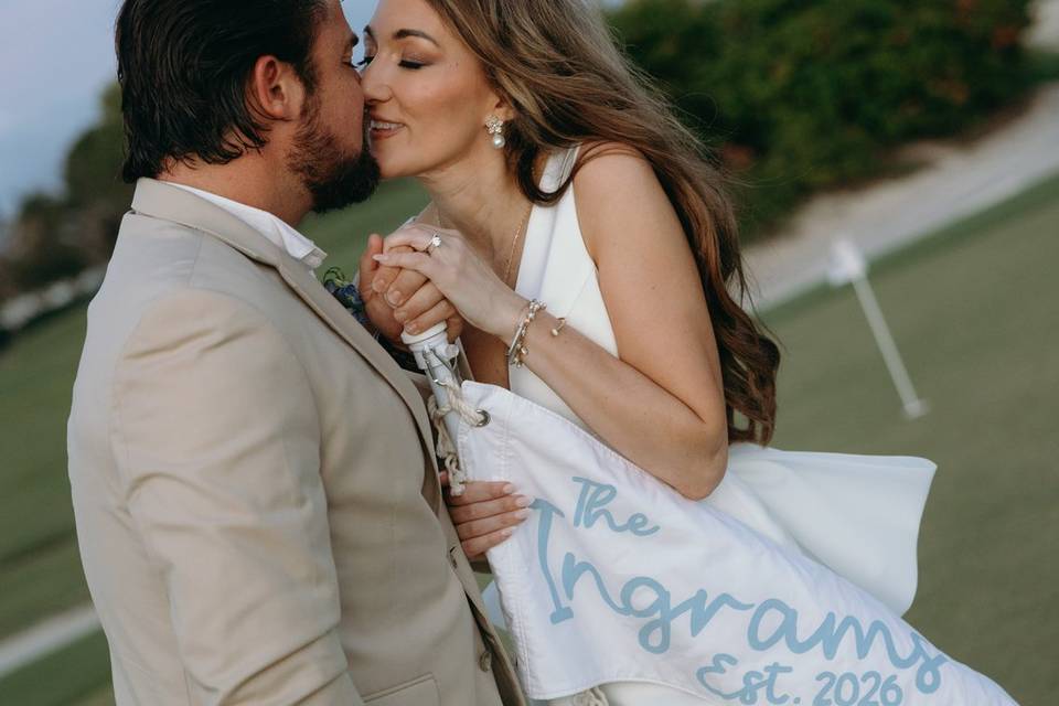 Bride and groom kissing