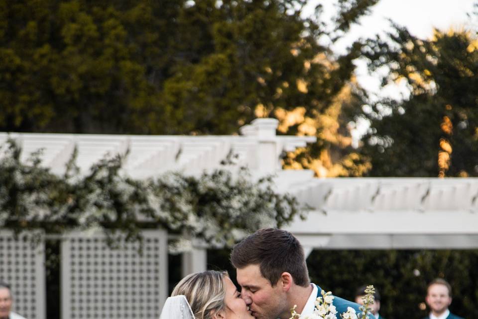 Mid Aisle Kiss