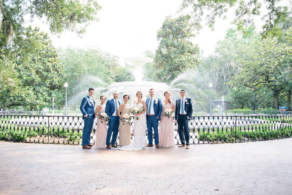 The couple with the bridesmaids and groomsmen