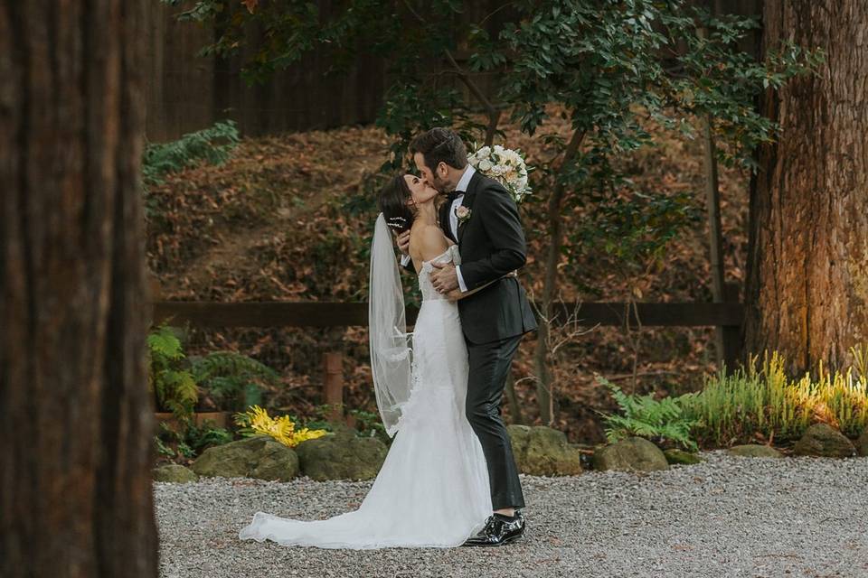 Bride and groom kissing