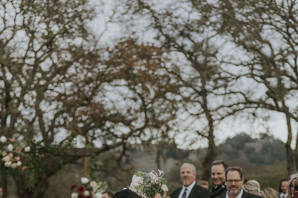 Bride and groom kissing