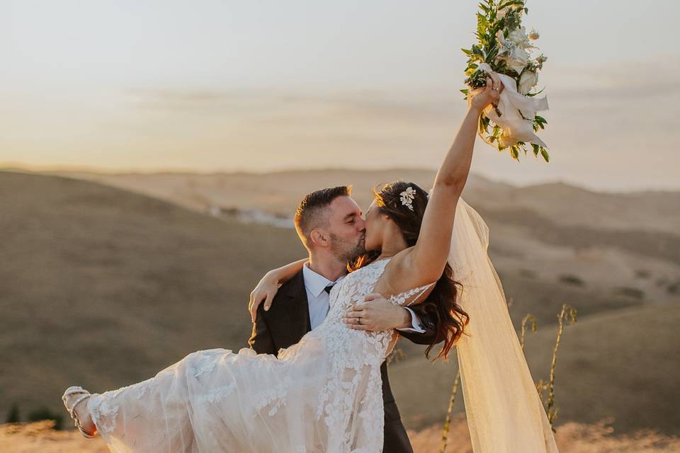 Bride and groom kissing