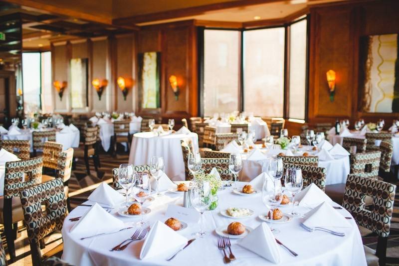 The color scheme of the room allows for a simple, traditional set-up as well as a splash of color.  Let us know if you would like us to rent a perfect colored linens of your choice.
