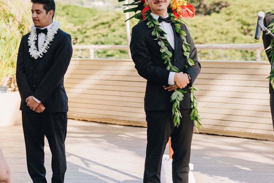 Groom waiting at the alter