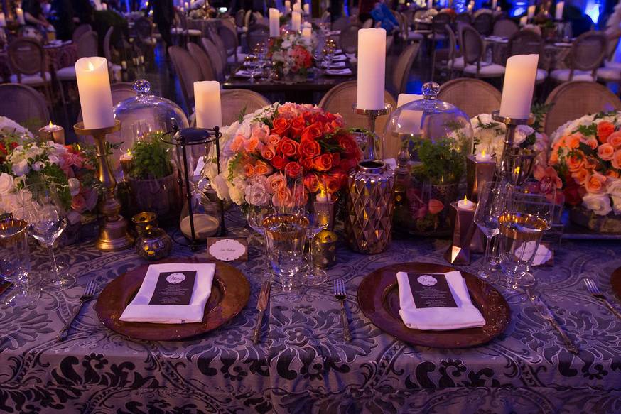 Long tables featured short floral and collections of different decor items.