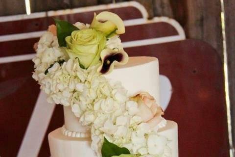 3-tier cake with cascading flowers