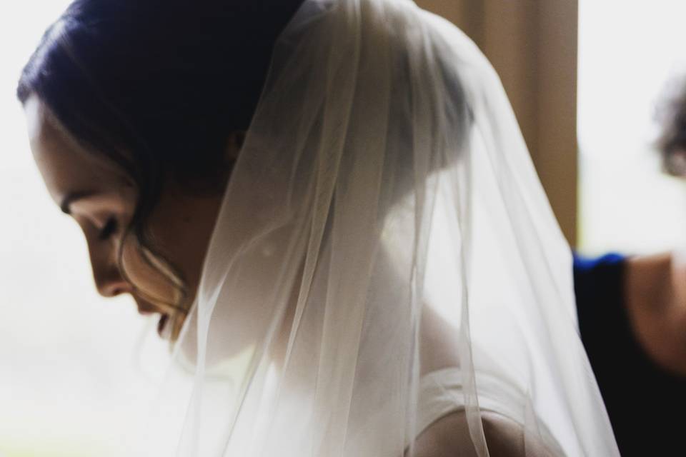 Bride getting dressed