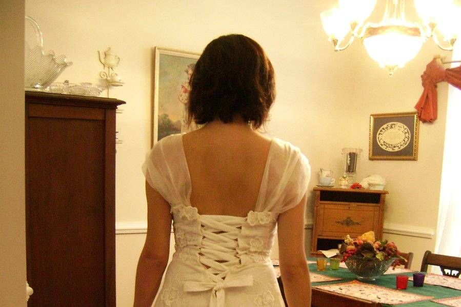 Custom redesign of a vintage heirloom gown - replaced zipper with ribbon/loop closure.