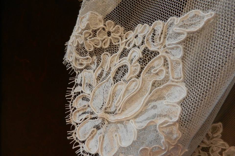 Close-up of Alencon re-embroidered detail