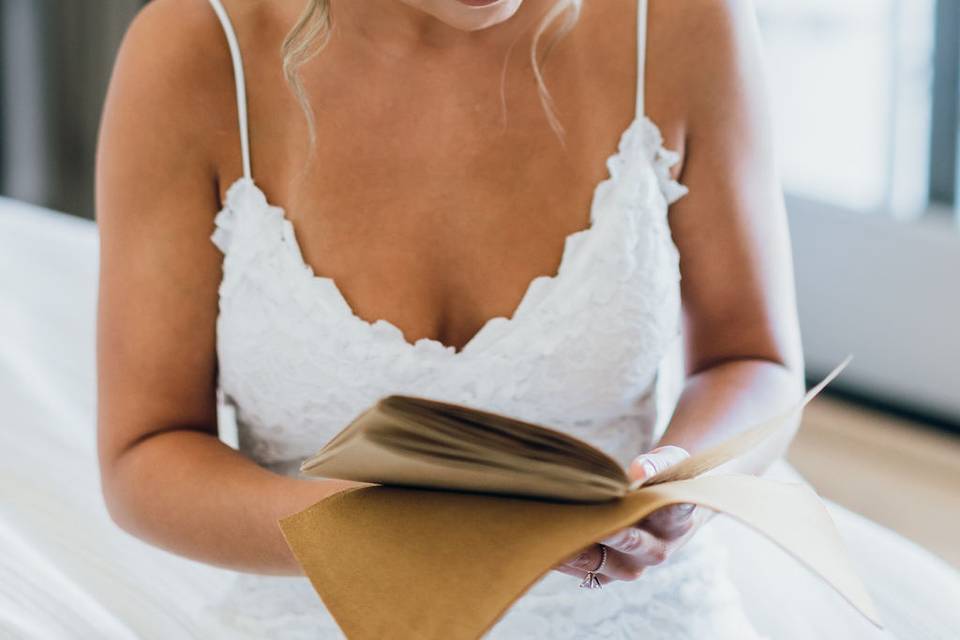 Reading a letter from groom